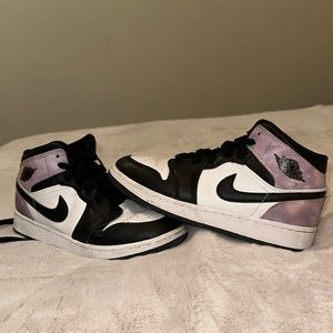 I’m selling Nike sneakers size 4 kids with a pink and purple tie-dye color